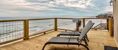 Large private deck overlooking beautiful beach views