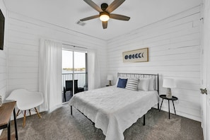 Bedroom #1 with a waterview & balcony access