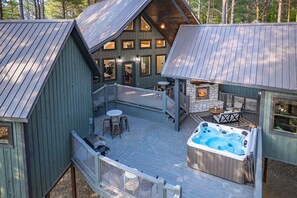 Each of the pods is connected by elevated decking designed for outdoor living.