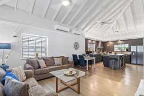 Find your cozy corner in our spacious living room, a hub of relaxation and entertainment