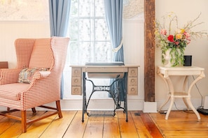 This sun filled room looks out on the Mystic River.