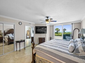 Master bedroom with an ocean view