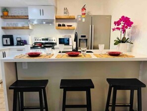 Dining area in modern kitchen setting.