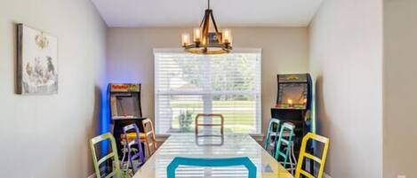 Dining Area with Game Consoles 