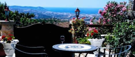 Beautiful courtyard with stunning views of the fields and sea!
