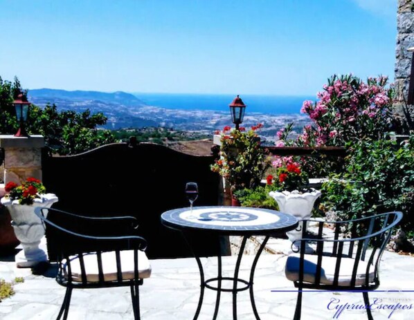 Beautiful courtyard with stunning views of the fields and sea!
