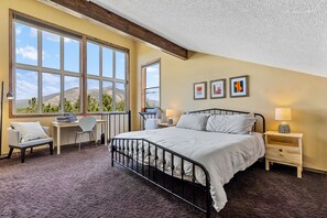King sized bed with views of Mt. Elden!