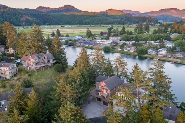 Bird's eye view of front of home and the Nestucca River.