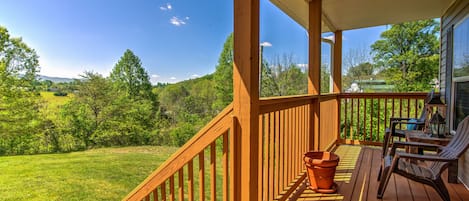 Sit back and relax on this cozy front porch.