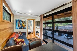 living - please note: the glass garage door has been converted to sliding glass doors.