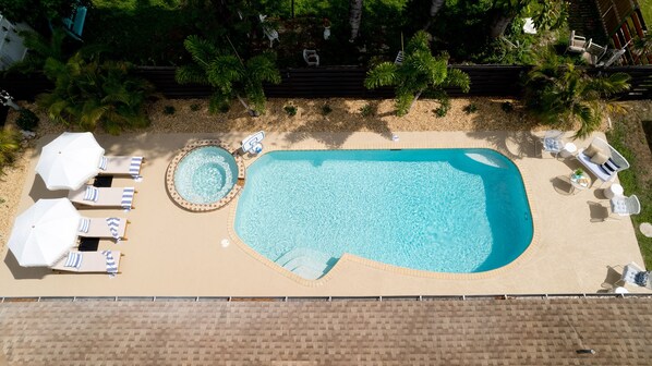 Dive into relaxation and soak up the serenity in our private saltwater pool and spa. Your ultimate getaway awaits! 💦🌴