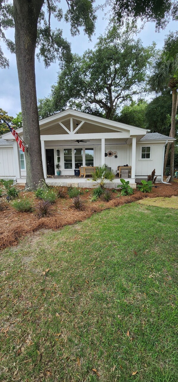 Charming front porch with fire pit for cool evenings