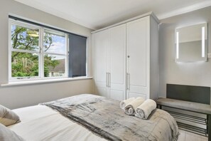 Complete with ample full-sized cabinets for your belongings and a charming window that fills the space with natural light.