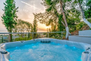 Relax in the outdoor jacuzzi – Shaded, soothing, and secluded

