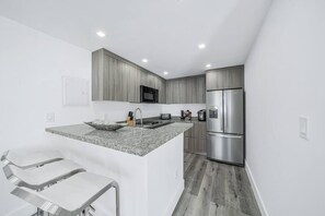 Fully Renovated and Equipped Kitchen. Marble tops and spacious cabinets to store all your family needs