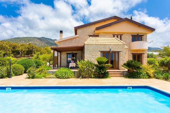 Beautiful villa with private pool, terrace, and garden with sea views