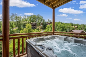 Indulge in the ultimate relaxation with a dip in this luxurious hot tub.