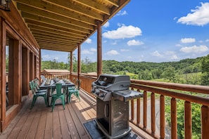 Grill, gather, and create lasting memories in this inviting outdoor space.