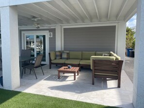 Seating around out by the pool in the back yard