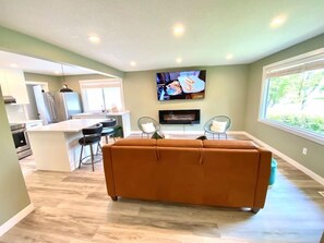 Living room with open kitchen 