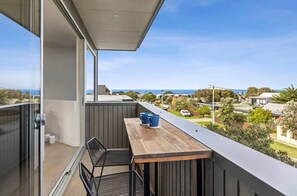 Enjoy your morning coffee, or happy hour drinks, overlooking the sea
