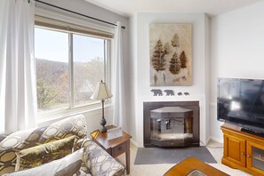 Large windows throughout bring a light and airy feeling to the cozy condo.