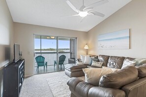 Living Space With Access To The Screened In Patio