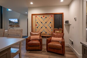 Seating Area Off Kitchen with Wall Scrabble