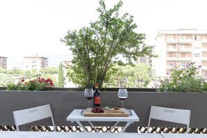 Plant, Table, Building, Window, Sky, Urban Design, Condominium, Tree, Real Estate, Tableware