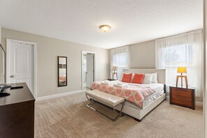 King Bedroom Suite with attached bathroom with large walk-in shower and garden tub, Dual sinks. Walk in closet