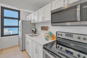 Indoors, Kitchen, Sink, Refrigerator, Microwave
