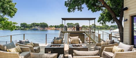 Enjoy outdoor lounging and dining overlooking the Colorado arm of Lake LBJ!