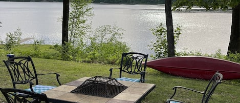 Beautiful fireplace table overlooking the water!