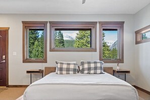 The great views can be seen from all over the home, including in the three bedrooms as seen here.