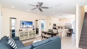 Room for everyone in the open concept living room, dining room and kitchen.