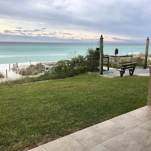 Taken from inside the unit Looking west Steps to the beach walkover