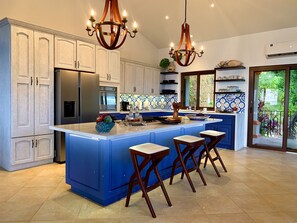 Kitchen with cooking island and modern appliances 