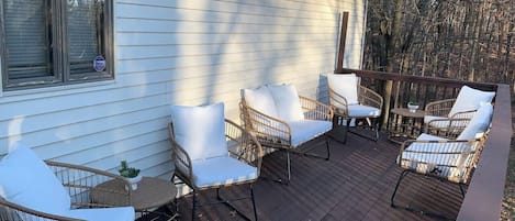 Plenty of seating for entertaining on the elevated back deck. You can watch the wildlife as they walk through the yard, feed the deer, or just take in the fresh mountain air. 