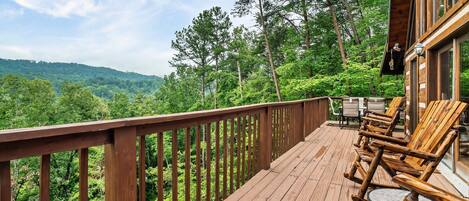 Main level deck offers plenty of seating options and nice views