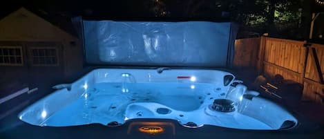 3-4 person hot tub on back deck to soak and relax