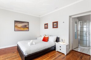 Retreat to this tranquil bed, featuring a comfortable bed and a view that will inspire your dreams.
