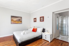Retreat to this tranquil bed, featuring a comfortable bed and a view that will inspire your dreams.