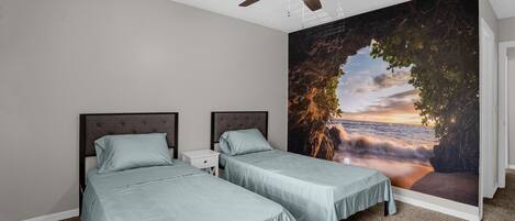 Bedroom with Gorgeous Wallpaper and Twin Beds