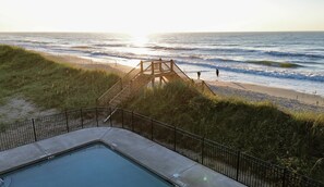 Oceanfront pool and private beach access.