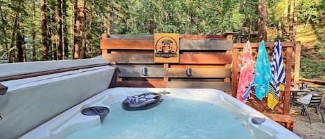 Indulge in the ultimate group retreat as you soak in our 6-person hot tub, surrounded by the beauty of the Redwood hills. No additional fees!