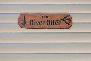 Embrace the whimsy and tranquility of 'The River Otter'—a delightful escape in the heart of nature's paradise