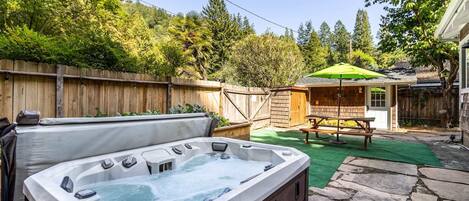 Relax and unwind with friends or family in our spacious 6-person hot tub, overlooking the Redwood hills. No extra charges!