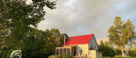 View of the house from the bottom of the hill