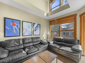 Bright living room with cozy sofas