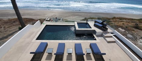 A slice of heaven: Where the pool meets the endless horizon of the beach